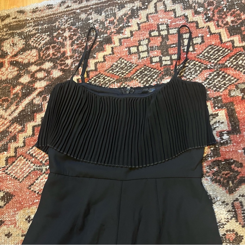 Accordion fringe swing top culotte jumpsuit